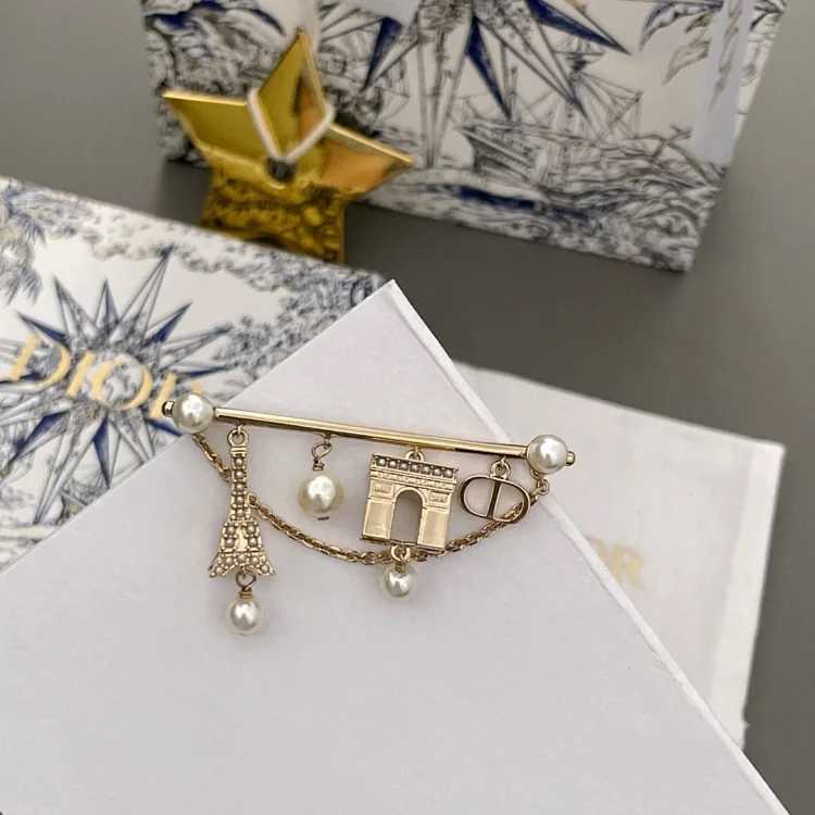 DR Brooch